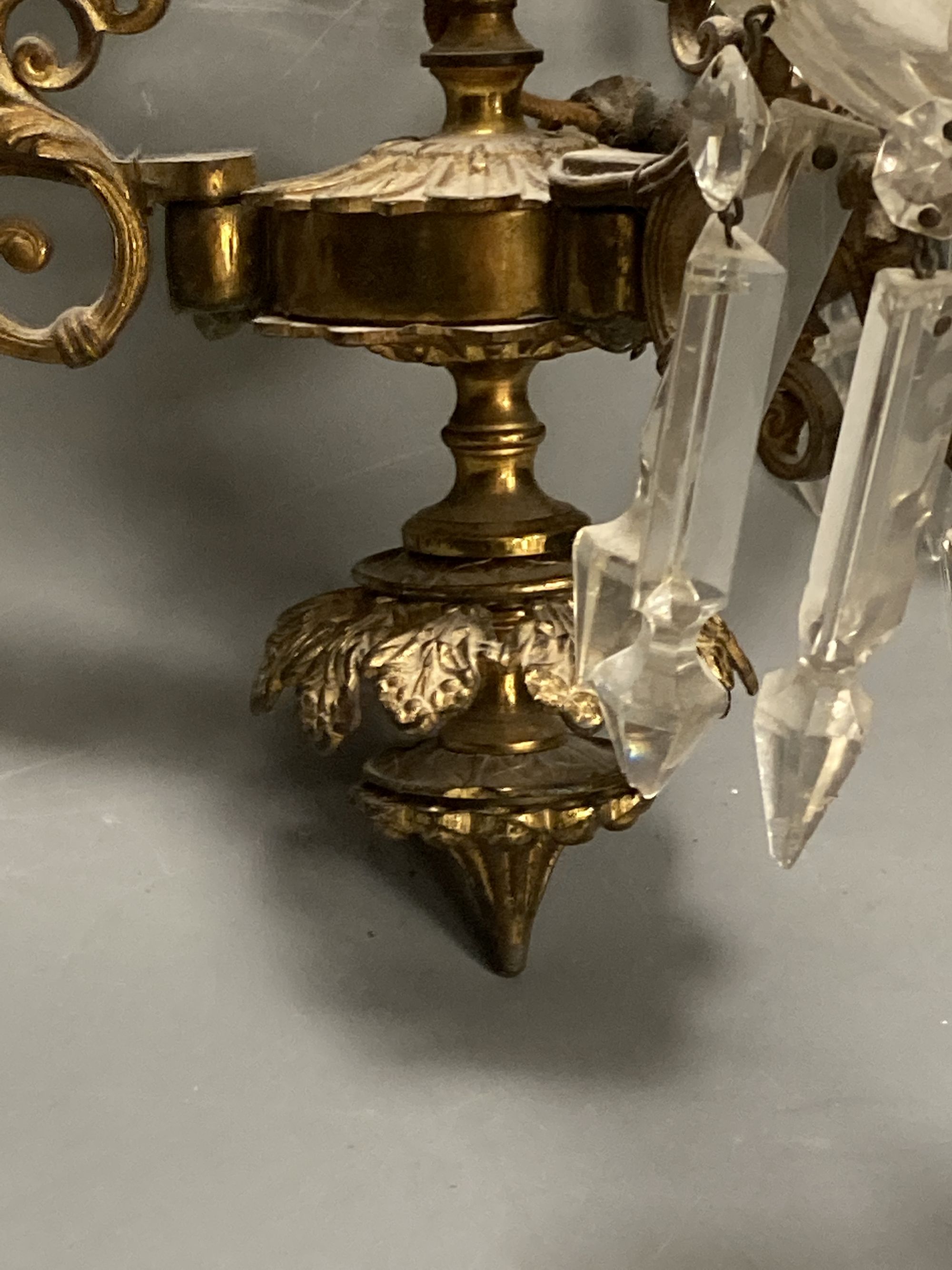 A three branch gilt and lustre drop electrolier